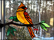 Female Cardinal in Stained Glass